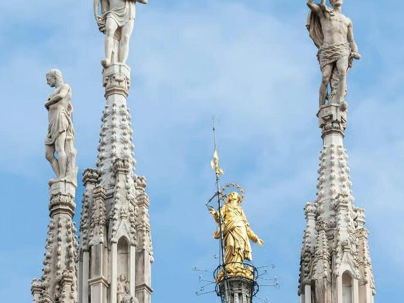 The gilded Madonnina between the Duomo's spires